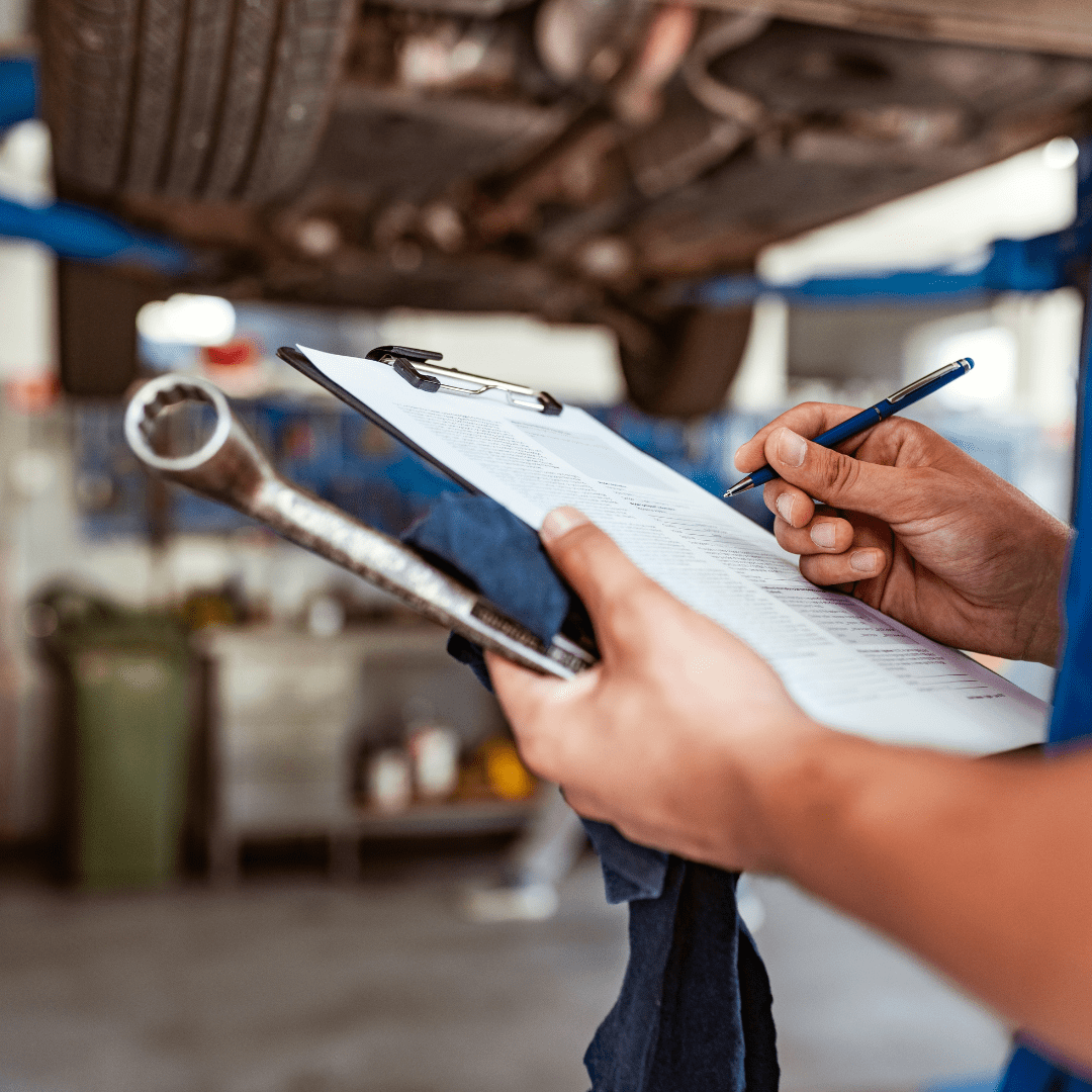 a man handling the services record sheet